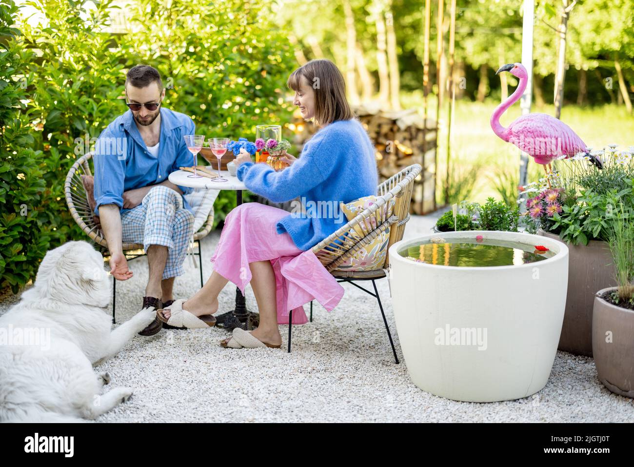 Stylish couple spend romantic evening at backyard Stock Photo