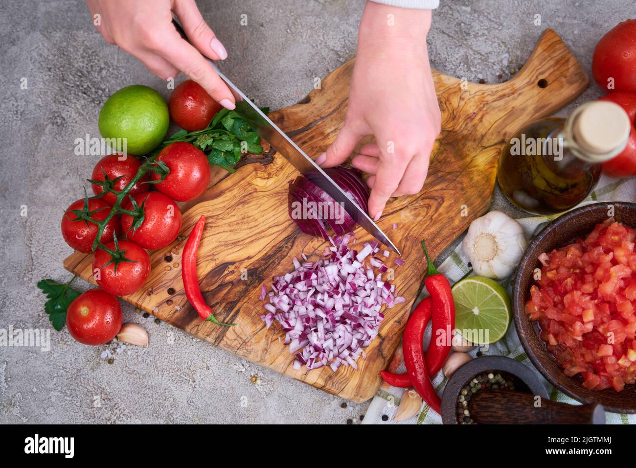 Woman chopping an onion hi-res stock photography and images - Alamy