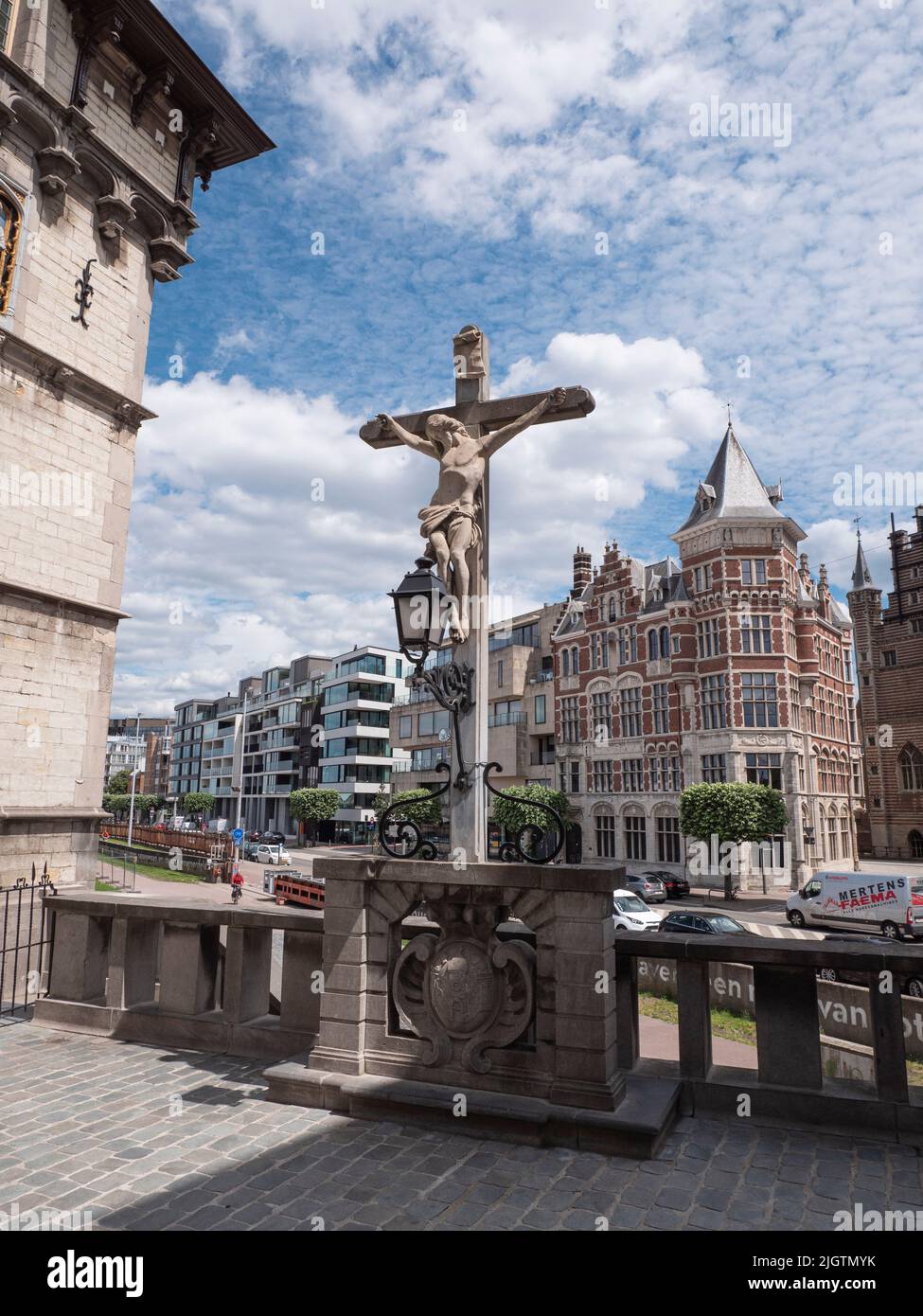 Antwerp, Belgium, 02 July 2022, the Effigy of Jesus Christ on the cross in the entrance of the castle Het Steen on the right bank of the Scheldt in th Stock Photo