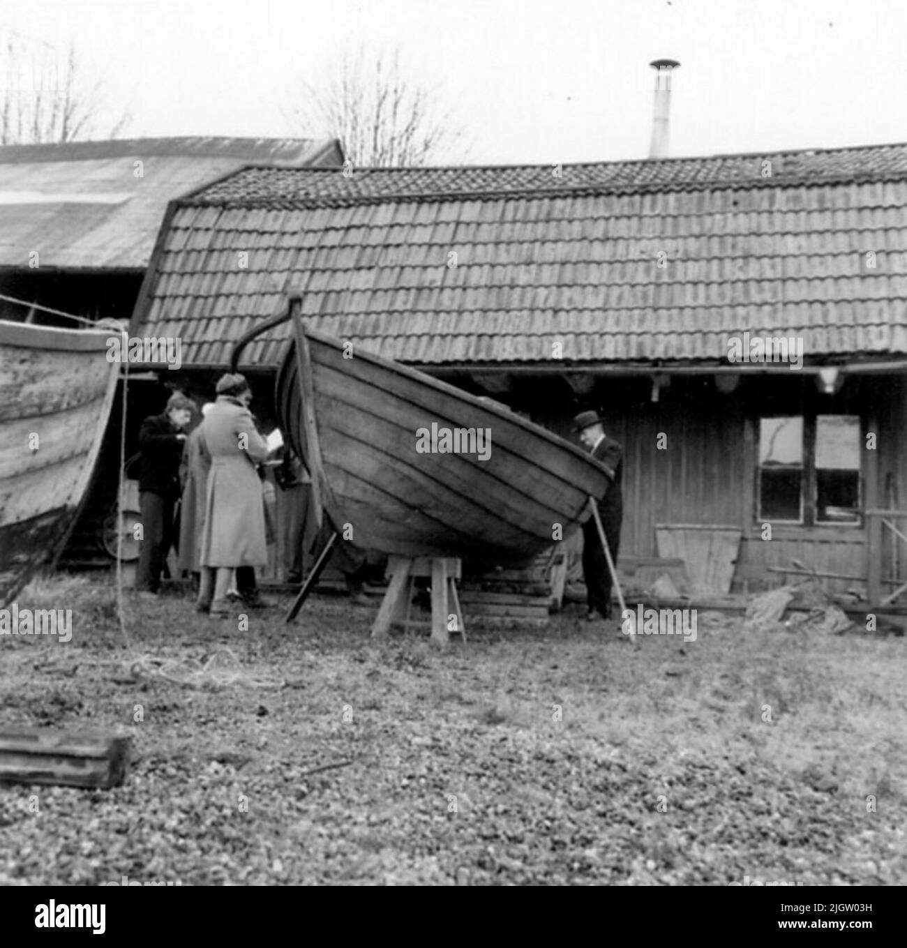 The photo Eat: 1958-11-12-1958-11-13 wing boat built by boat builder Arvid Engström 1901 for fishermen K. F. Juhlberg, both from Vaxholm.stockholms University's course in boat measurement 12-13 Nov. 1958. Stock Photo