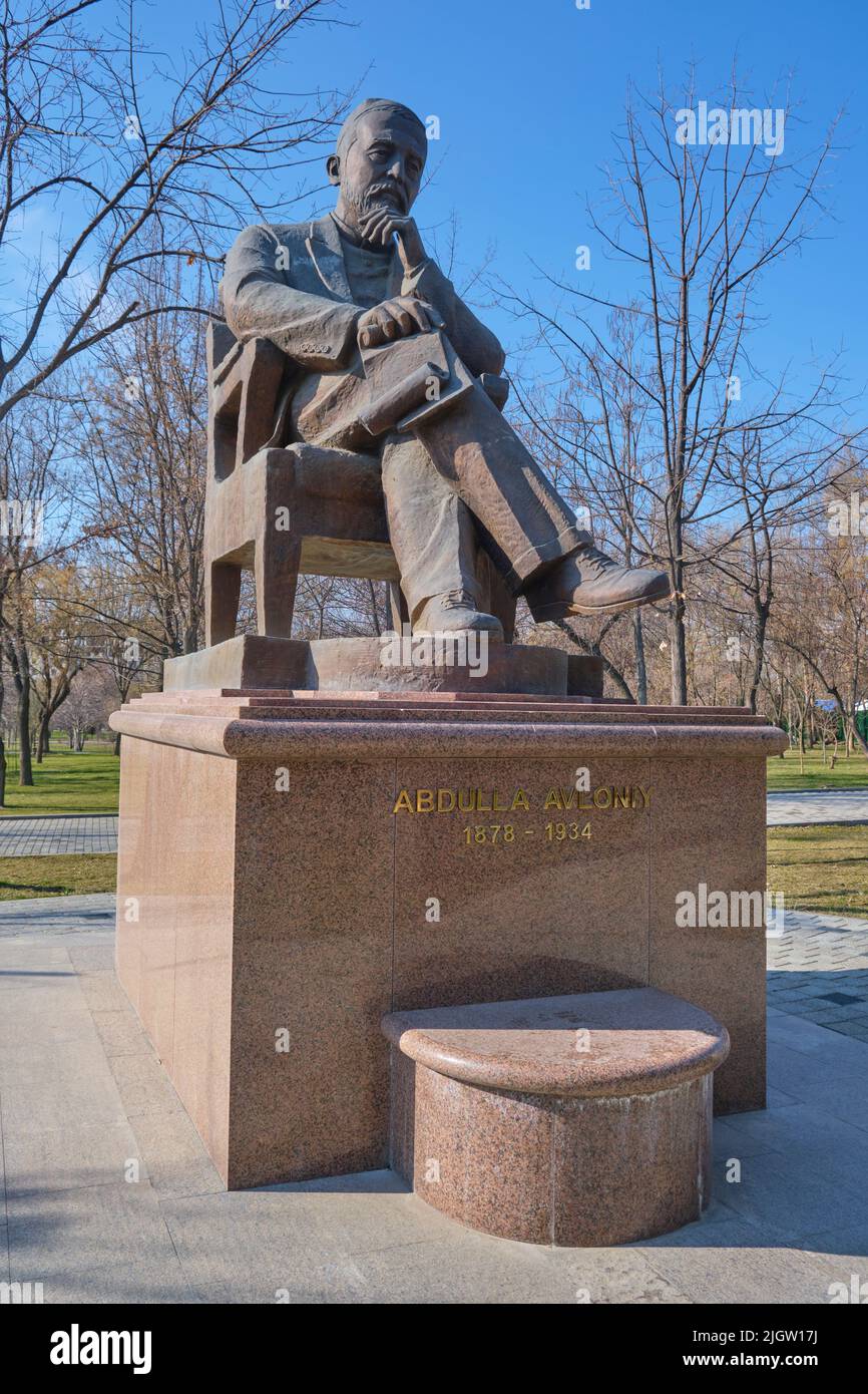 A bronze statue of a sitting Abdulla Avloniy, famous writer. At Alisher ...