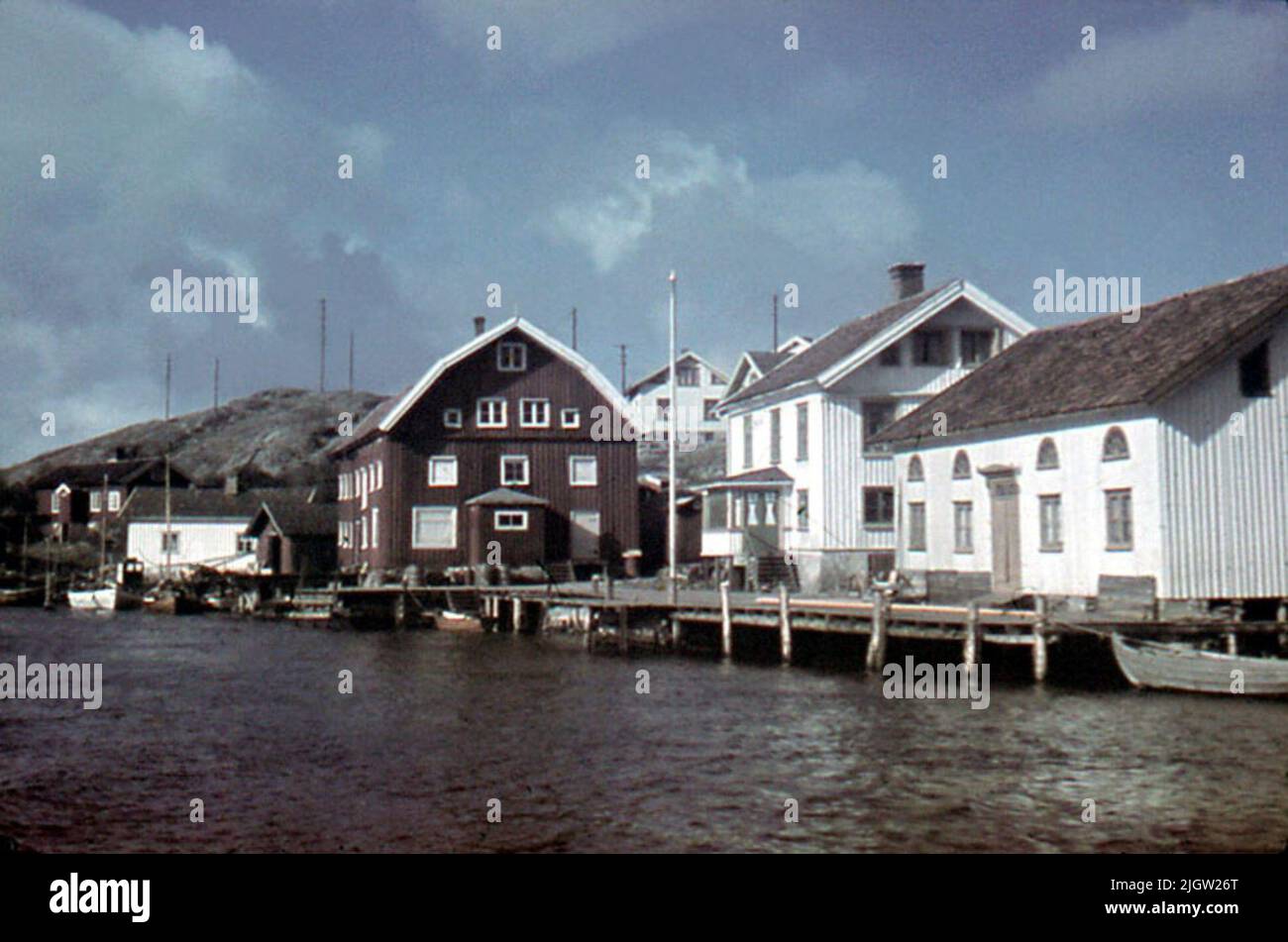View of part of a fishing village with residential buildings, harbor