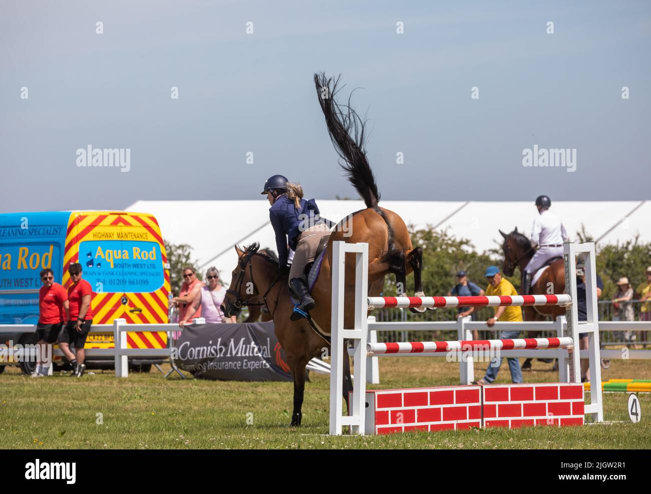 Horse jumping at Stithians country Show in Cornwall, UK Stock Photo Alamy