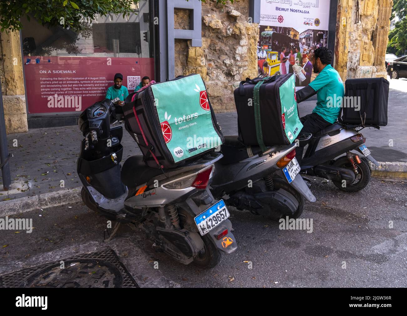 Syrian bikers from take away food delivery company Toters, Beirut Governorate, Beirut, Lebanon Stock Photo