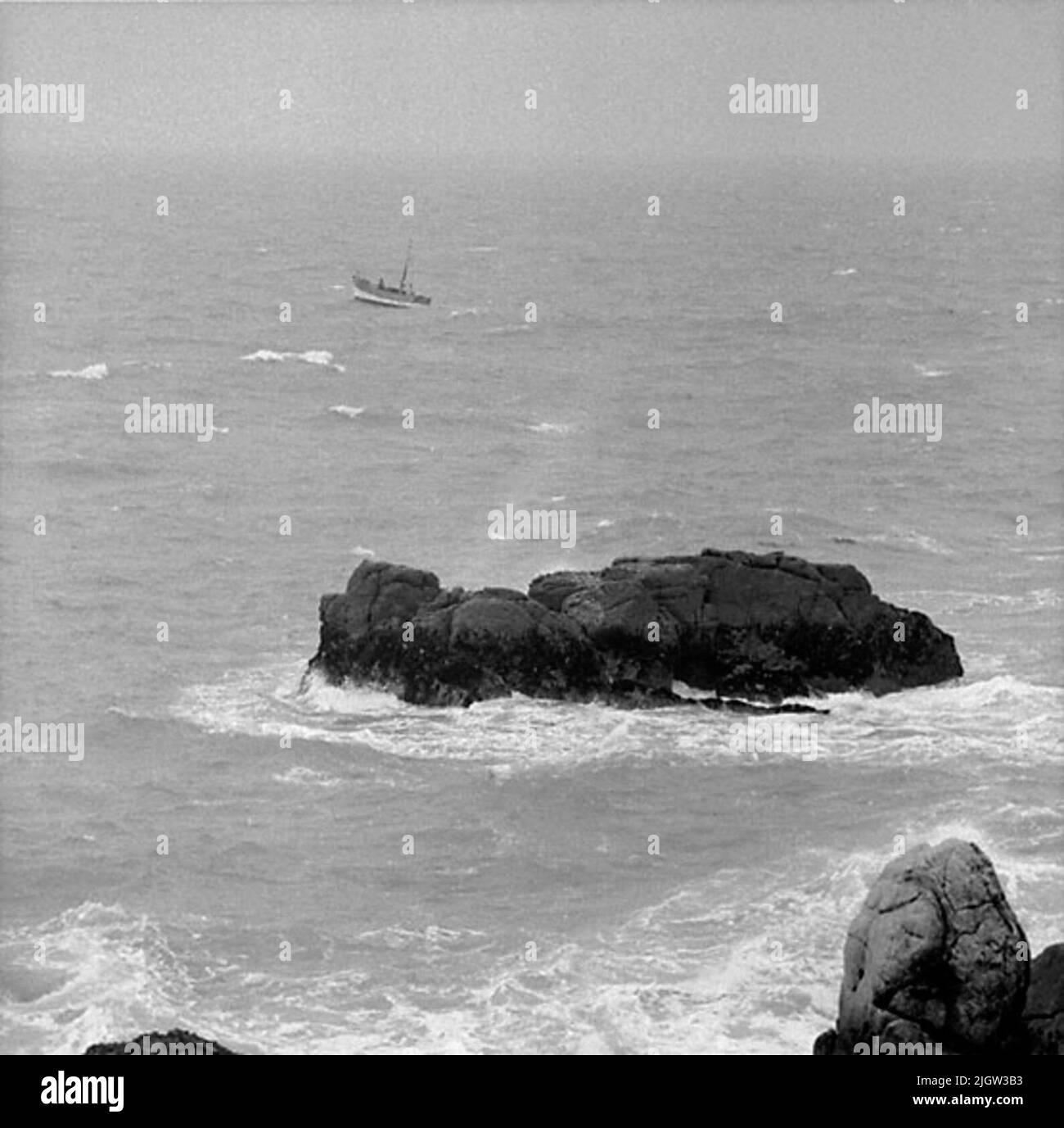 8. France. Photo journal is available at B.M.A. + Photo albums. Acquisition: Books and archive materials. Photos taken between 1959-10-16 and 1959-10-1712 Pictures in series. According to notes: France. Atlantic coast, Le Croisic, 17/10 -59. Beach fishermen in hard weather. A boat on the open sea, it is severe weather. In the foreground is a rocky beach that the waves oppose. Stock Photo