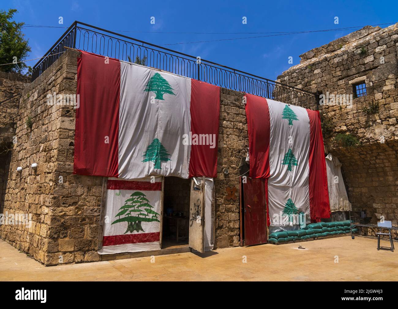 Lebanese flags in Citadel of Raymond de Saint Gilles, North Governorate, Tripoli, Lebanon Stock Photo