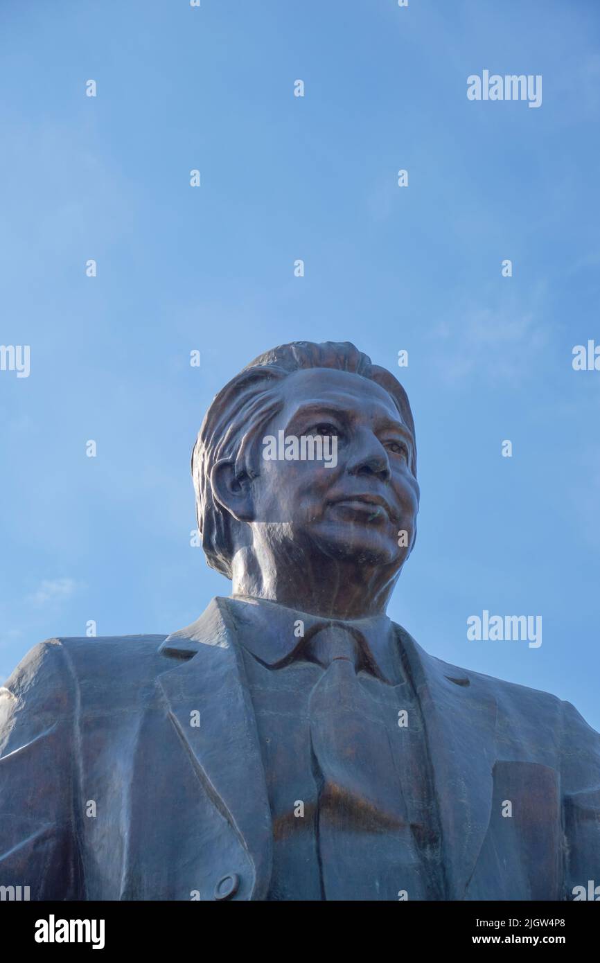 A bronze statue of a sitting Said Ahmad, famous writer. At Alisher ...