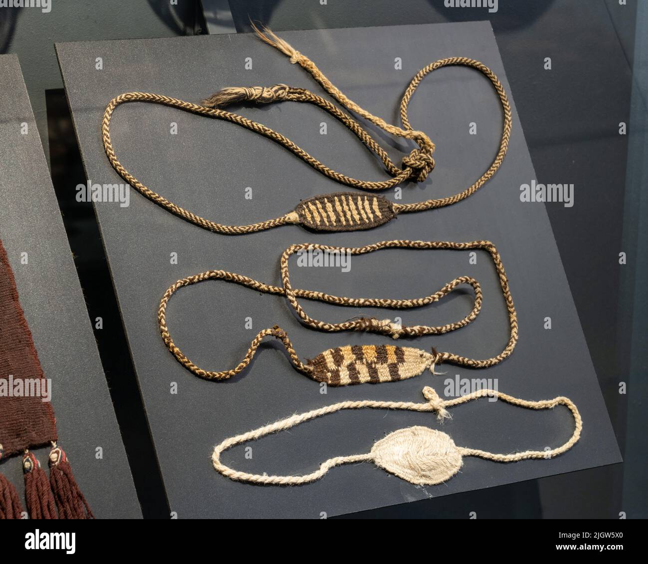 Slings as weapons from the Andean culture about 1000 A.D. in the San Miguel de Azapa Archeological Museum in Chile. Stock Photo