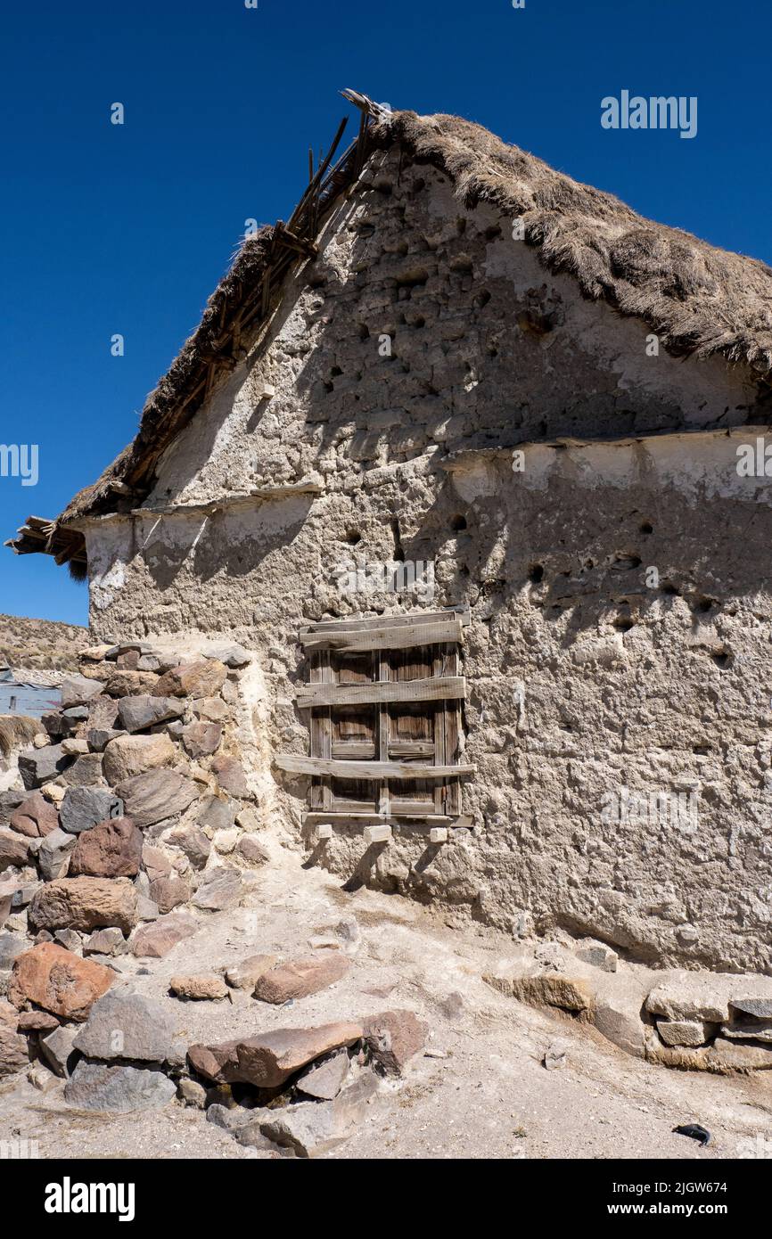 The rear of the Church of the Virgin of the Nativity in Parinacota on the Andean altiplano in Lauca National Park in Chile. Stock Photo