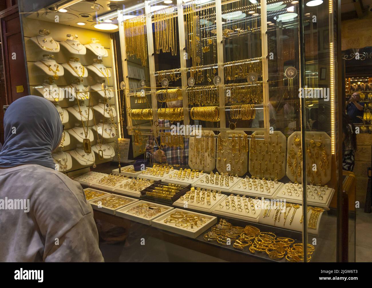 Woman looking at gold in a shop, North Governorate, Tripoli, Lebanon