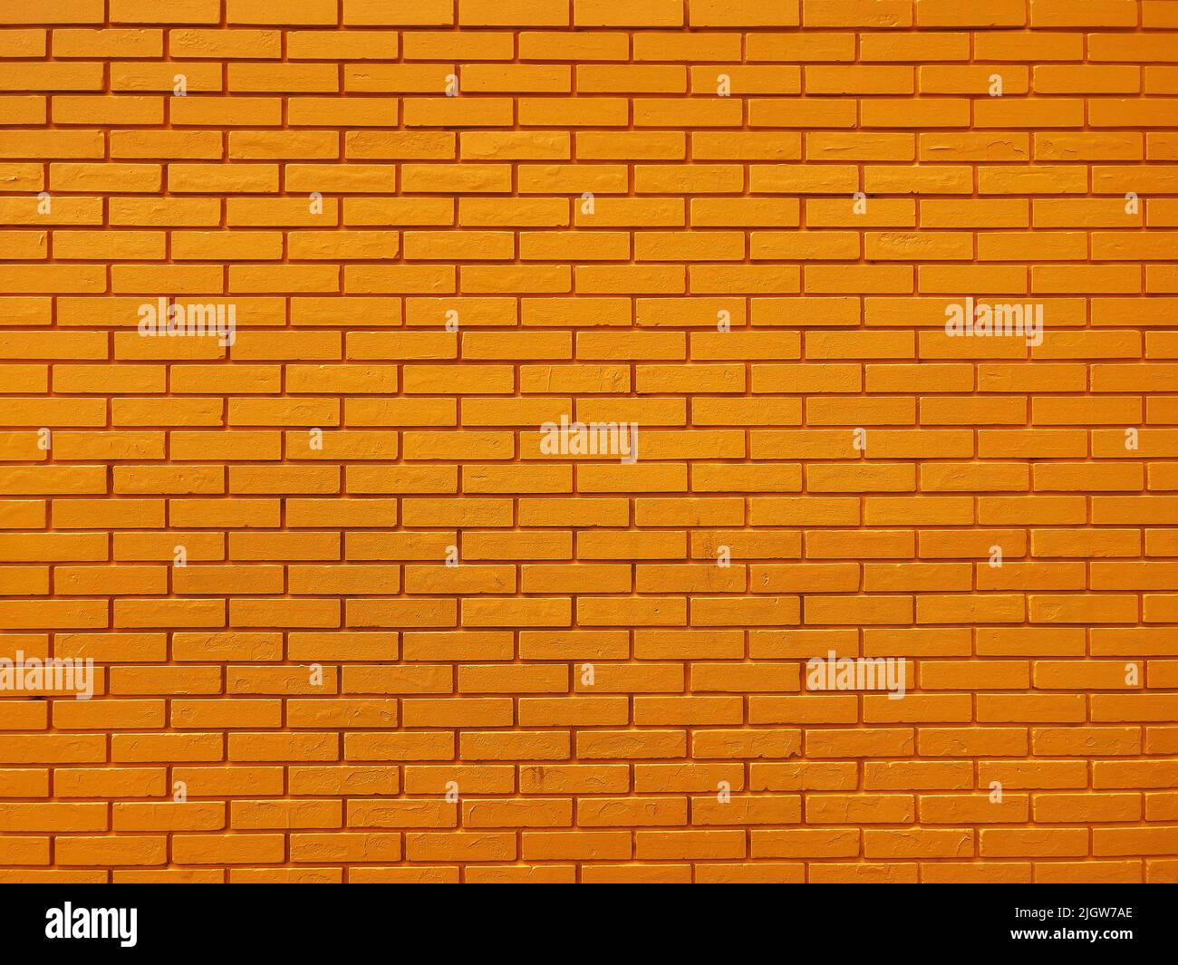 Yellow brick wall texture as background Stock Photo Alamy