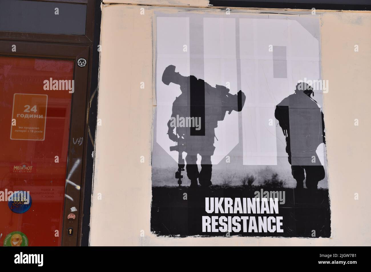 Graffiti with image of Ukrainian soldier seen on the streets of Odessa, Ukraine. Stock Photo