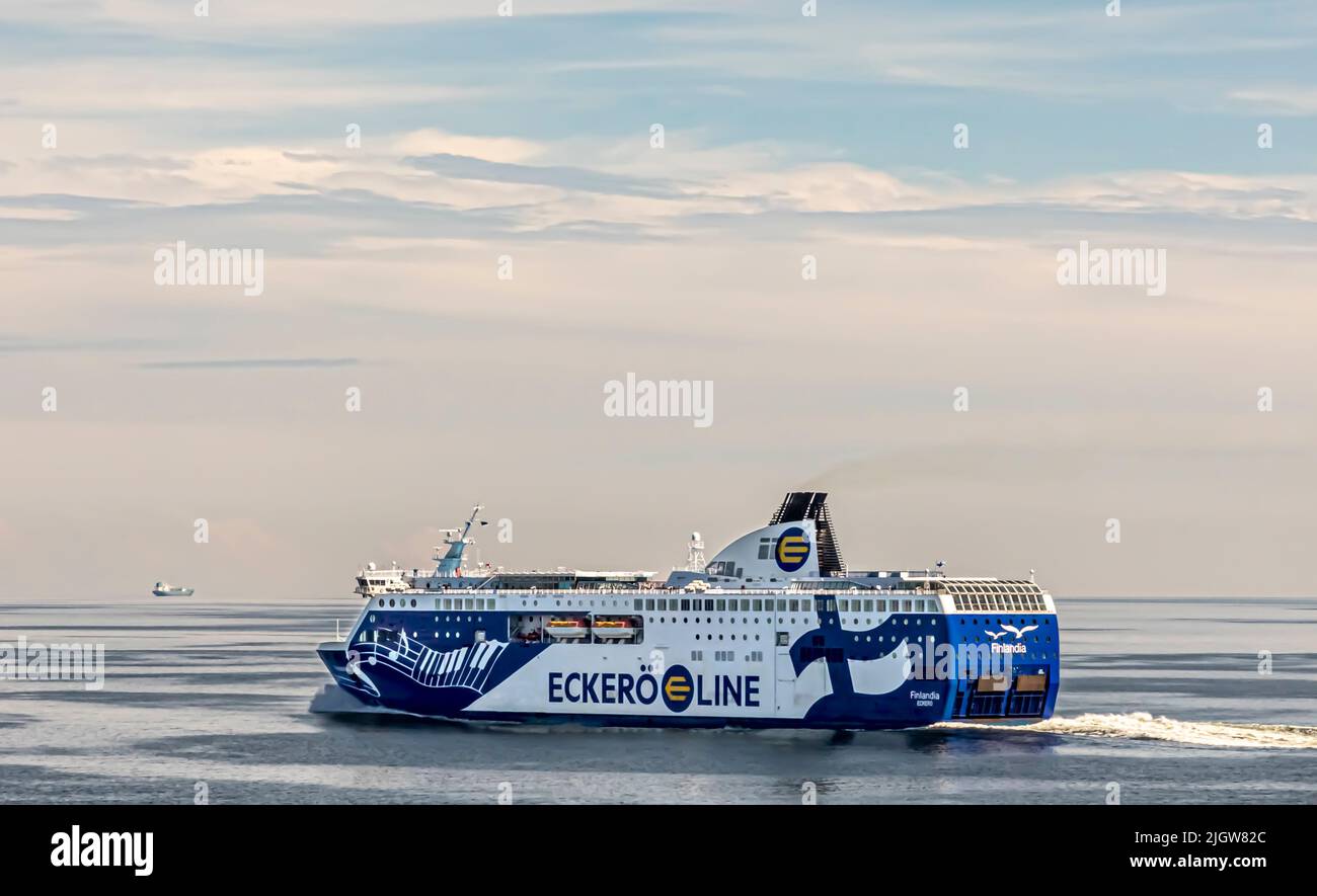 The Eckerö Line cruiseferry m/s Finlandia in the Gulf of Finland on a summer day. A cargo ship in the far background. Room for text. Stock Photo