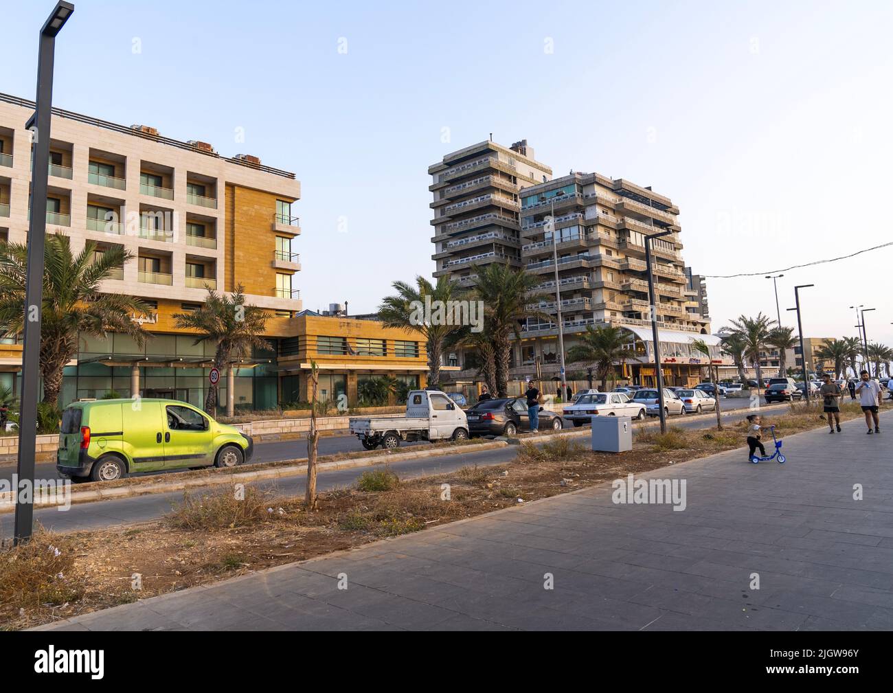 People walking in the seafront, North Governorate, Tripoli, Lebanon Stock Photo