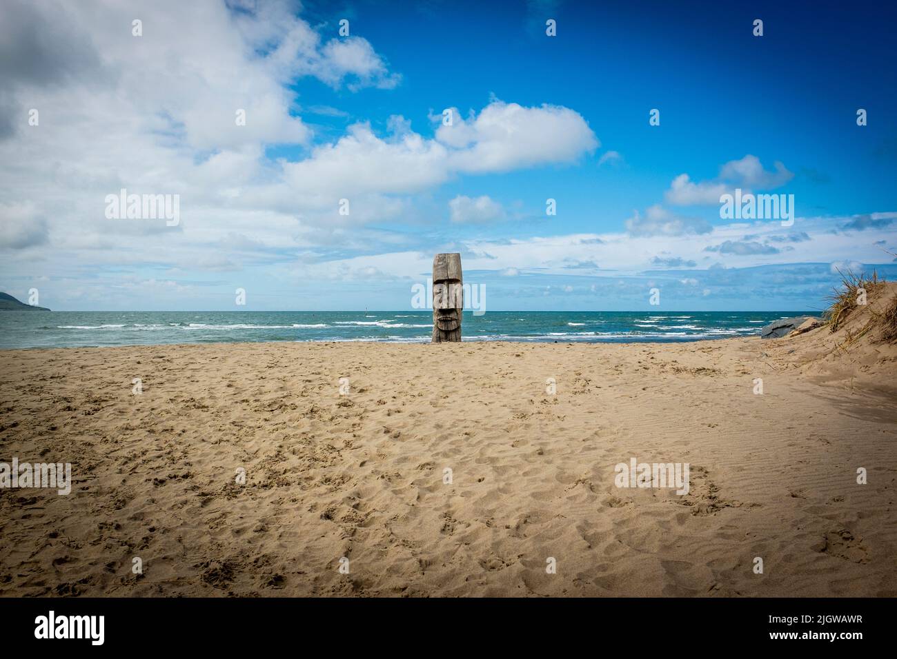 Wooden carved Easter Island Maori man, Barmouth Beach, North Wales ...