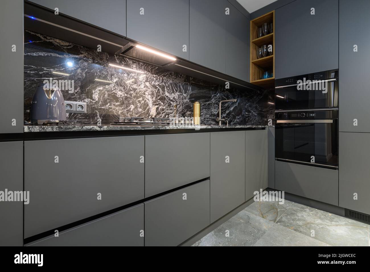 Corner view closeup to grey luxury kitchen Stock Photo