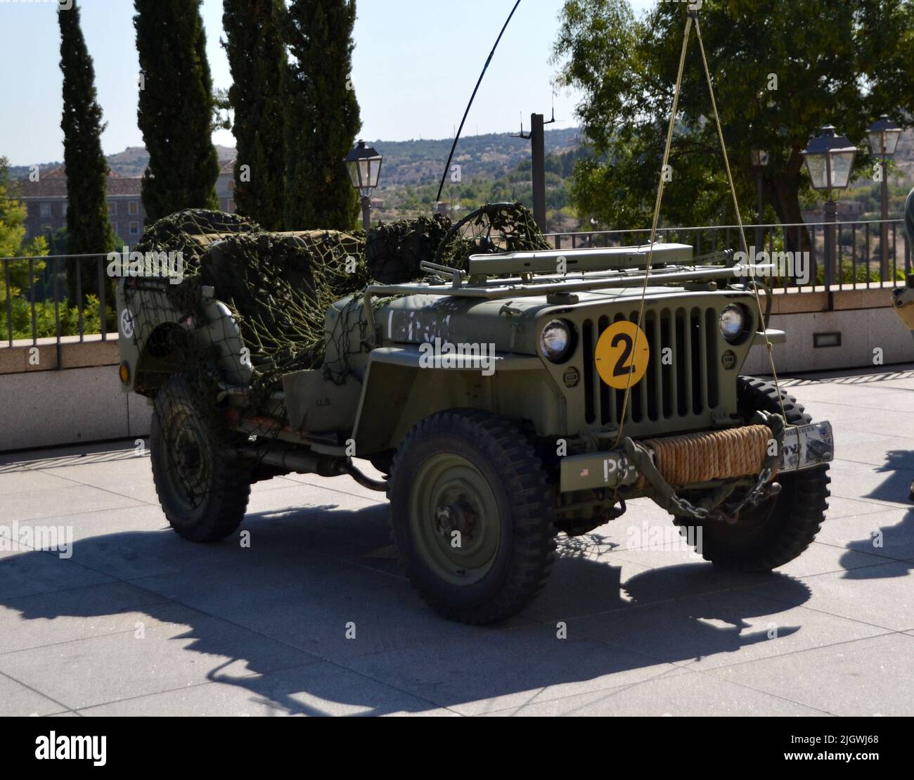 Camouflage green painted convertible offroad military vehicle Stock Photo Alamy
