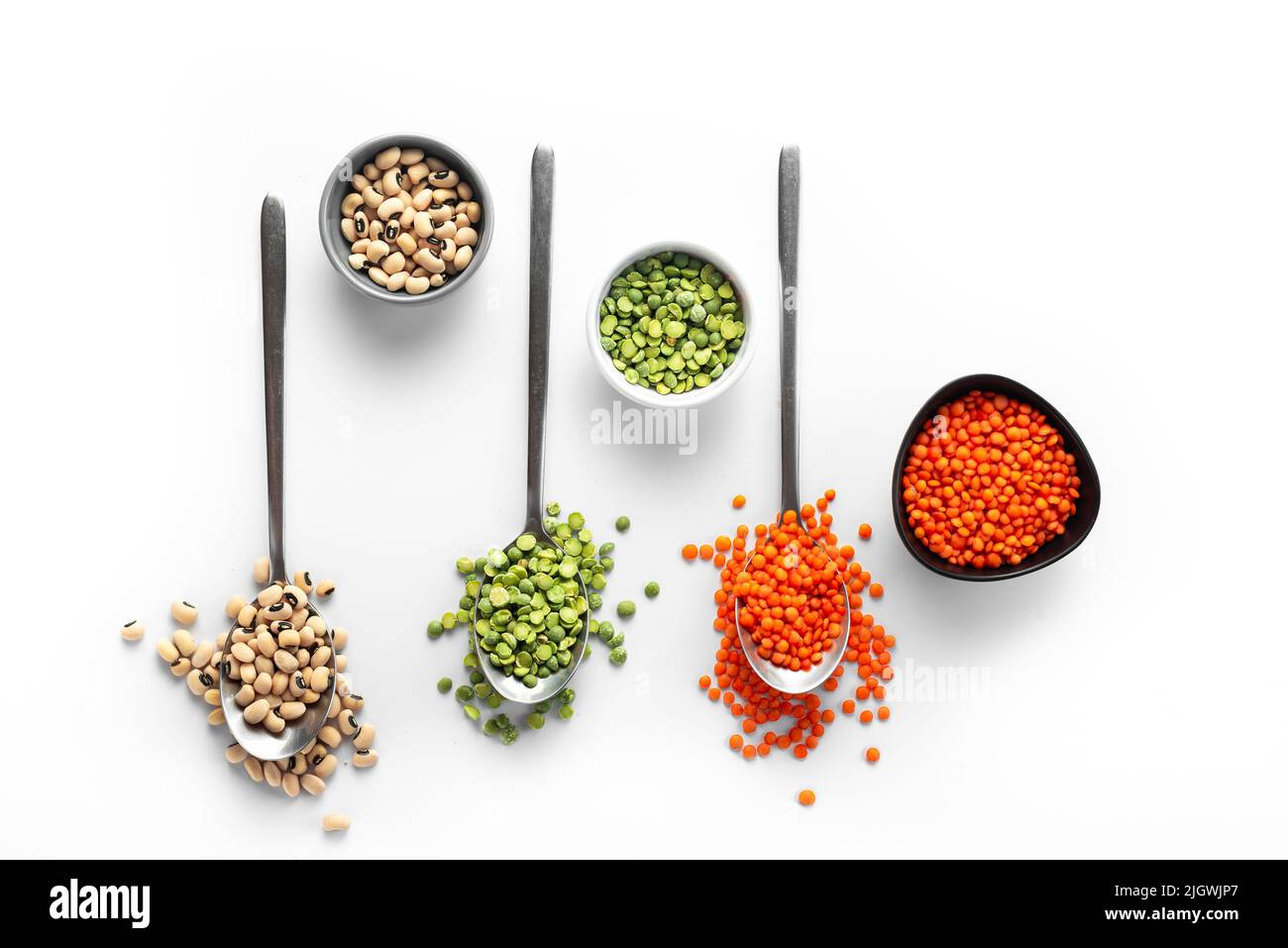 Super food tag with fenugreek seeds, bukwheat seeds, gold linseeds and brown linseeds. Stock Photo