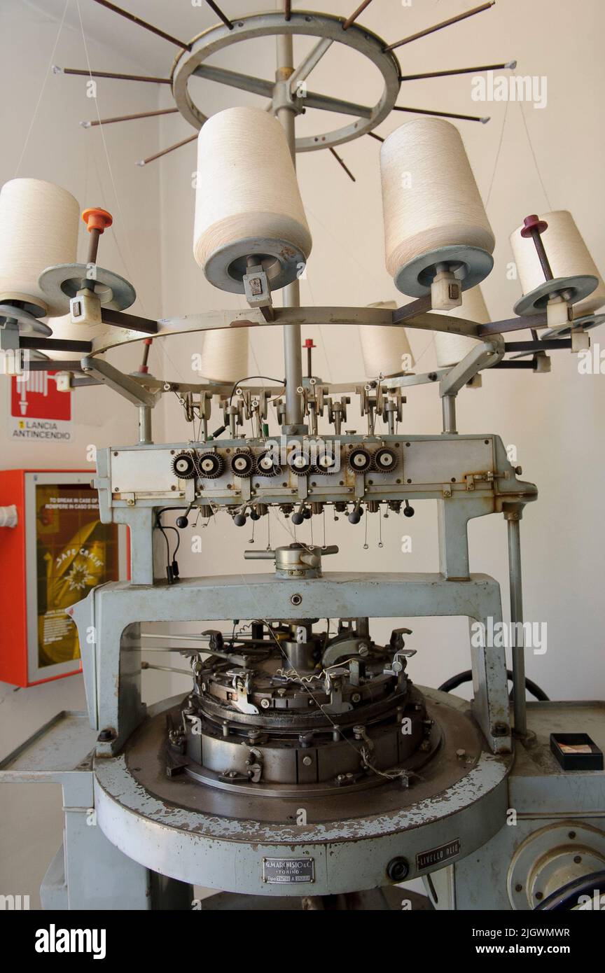 2020 july 07 - Europe, Italy, Lombardy, Varese country, Busto Arsizio, textile museum with old machines for fabric processing. circular machine for ci Stock Photo