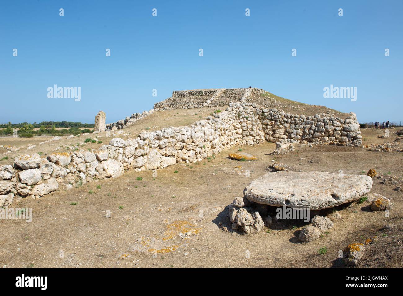 6 june 2021 - Europa, Italy, Sardinia Prehistoric altar Monte d'Accoddi is megalithic monument in Sassari,  Ruins of ancient step pyramid and a menhir Stock Photo