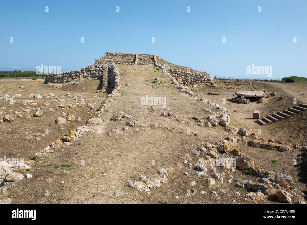 6 june 2021 - Europa, Italy, Sardinia Prehistoric altar Monte d'Accoddi is megalithic monument in Sassari,  Ruins of ancient step pyramid and a menhir Stock Photo