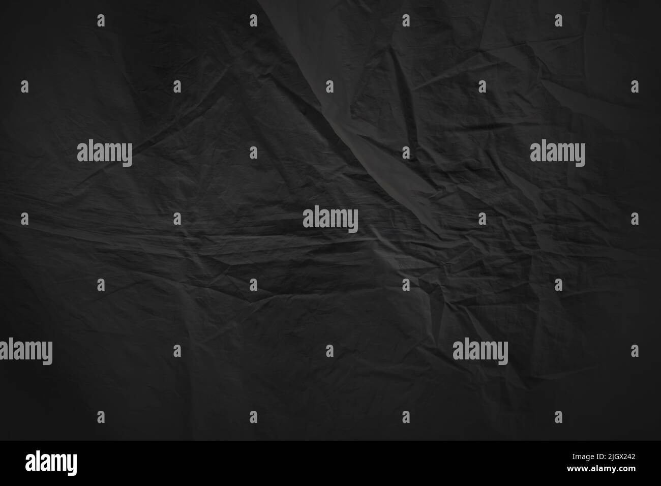 Black wrinked haning tarp full frame abstract background texture Stock Photo