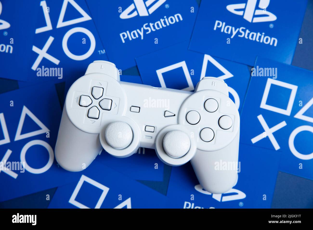 LONDON, UK - July 2022: Sony playstation logo against a blue background. Playstation is a video game brand Stock Photo