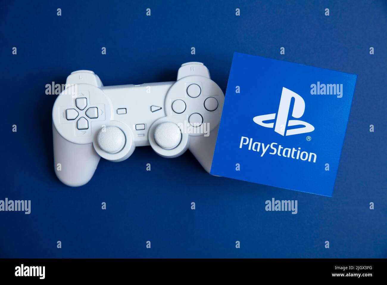 LONDON, UK July 2022 Sony playstation logo against a blue background. Playstation is a video