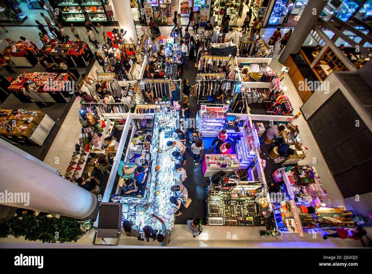 A mall display photographed from above as people buy merchandise. Stock Photo