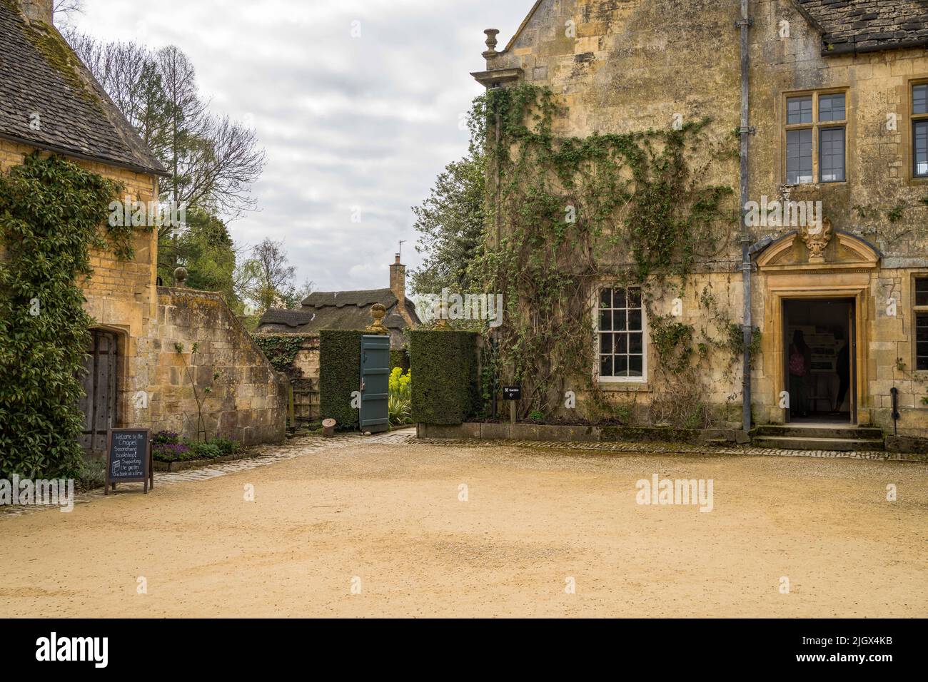 Main HOuse and chapel, Hidcote Manor Estate, early spring, Chipping Campden, Glouscestershire UK Stock Photo