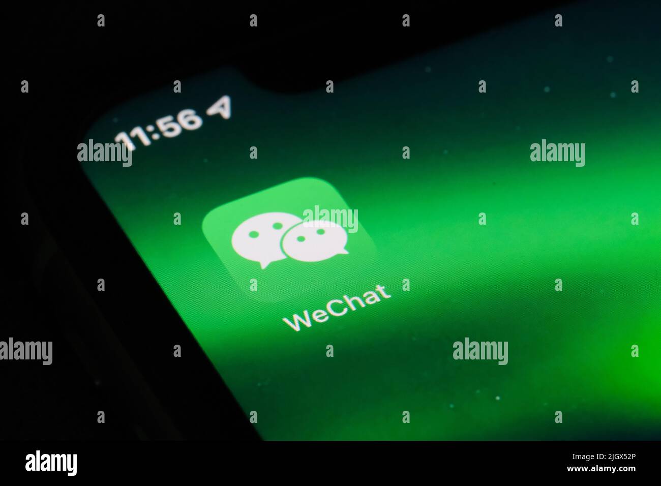 Shanghai,China-Feb. 19th 2022: close up Wechat mobile app icon on phone screen.  A Chinese instant messaging, social media and mobile payment app deve Stock Photo