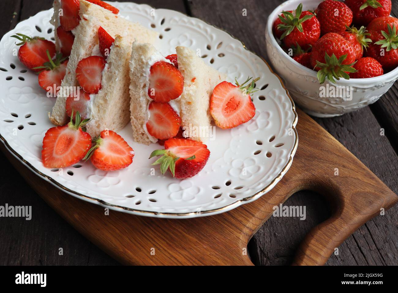 Strawberry Sandwich , Japanese Popular Dessert, Sandwich with Cream and Fruit Slice Inside Stock Photo