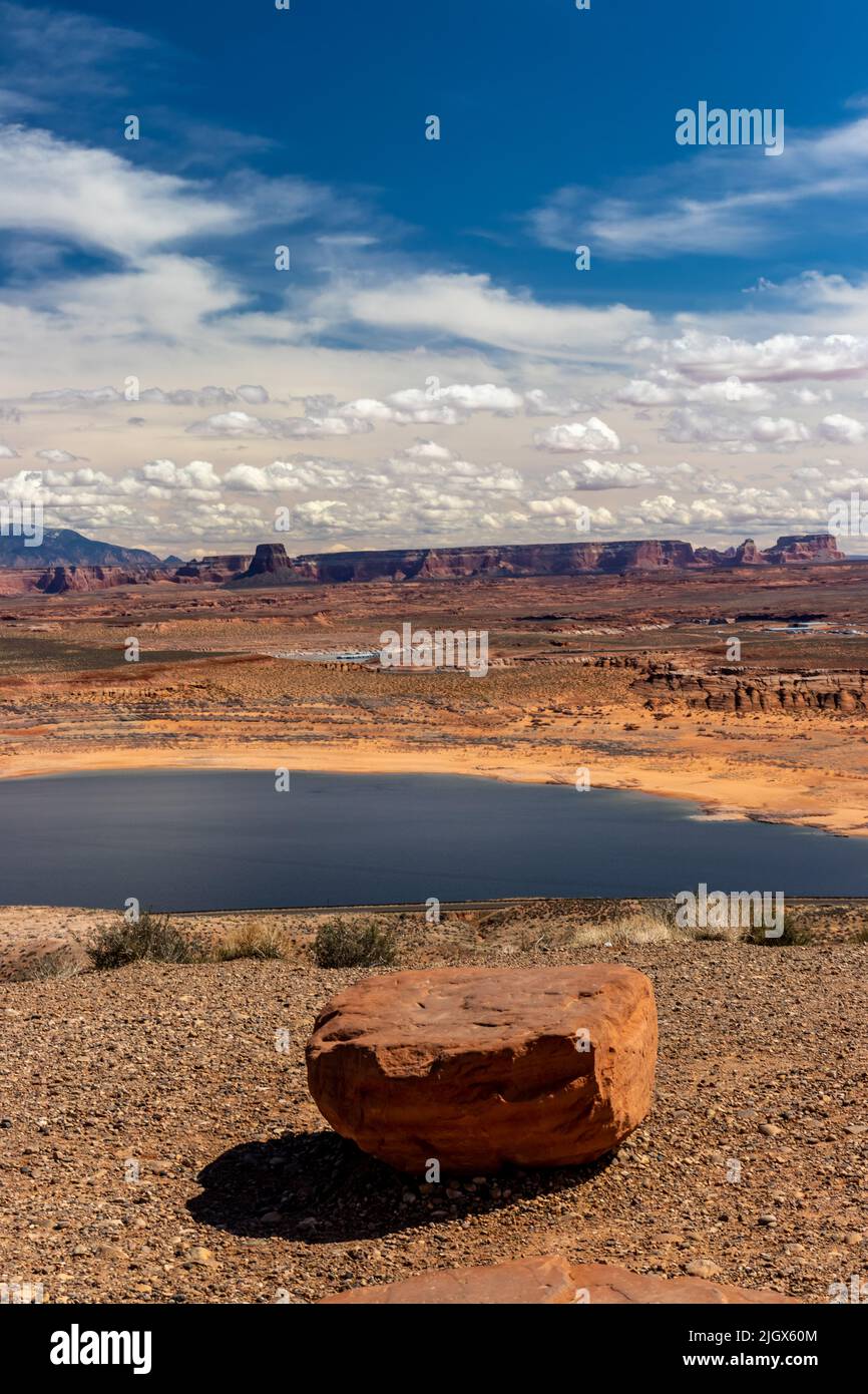 Foreground rock, middle ground river and background hills and clouds ...