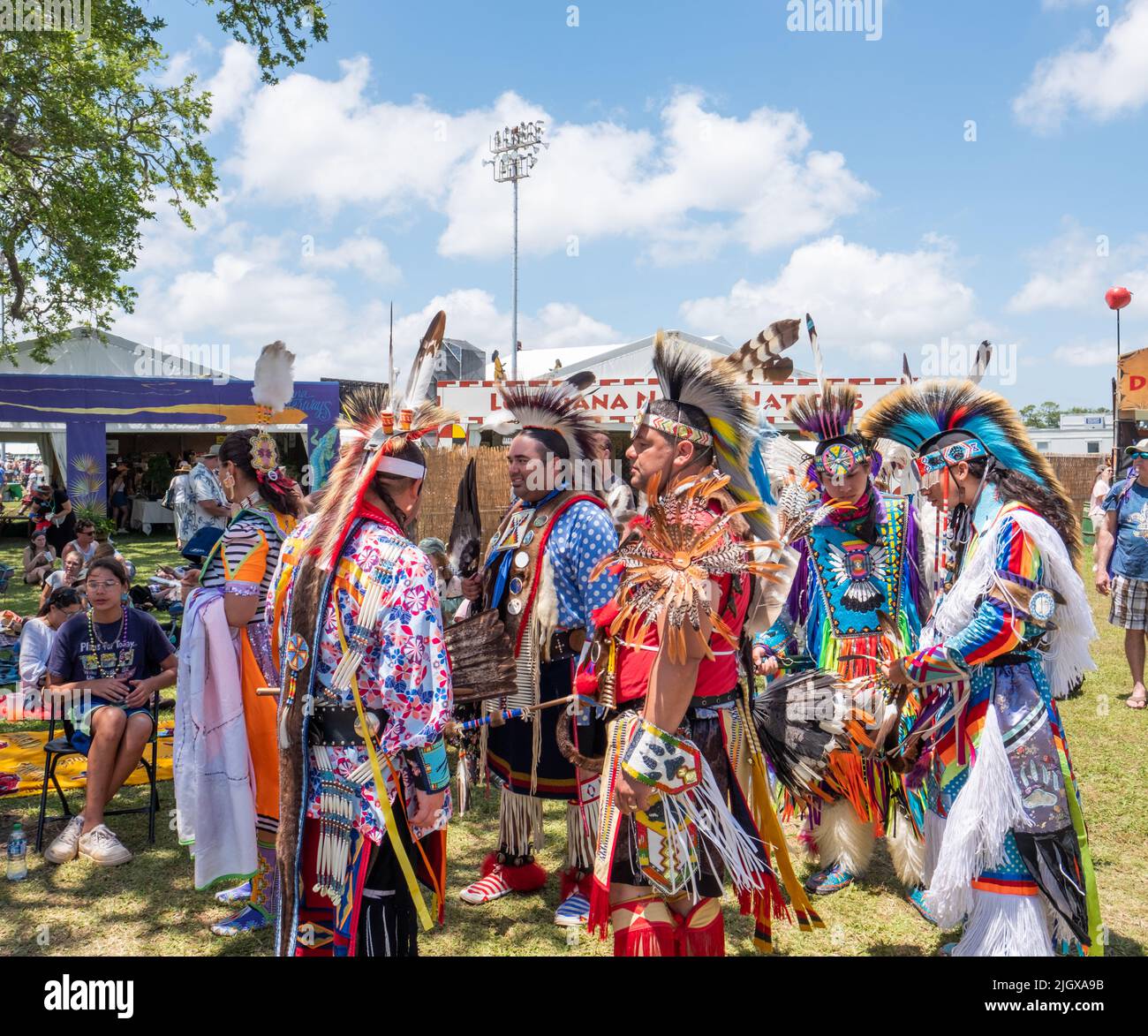 NEW ORLEANS, LA, USA - MAY 1, 2022: Native Americans in traditional dress perform at the 2022 New Orleans Jazz and Heritage Festival Stock Photo
