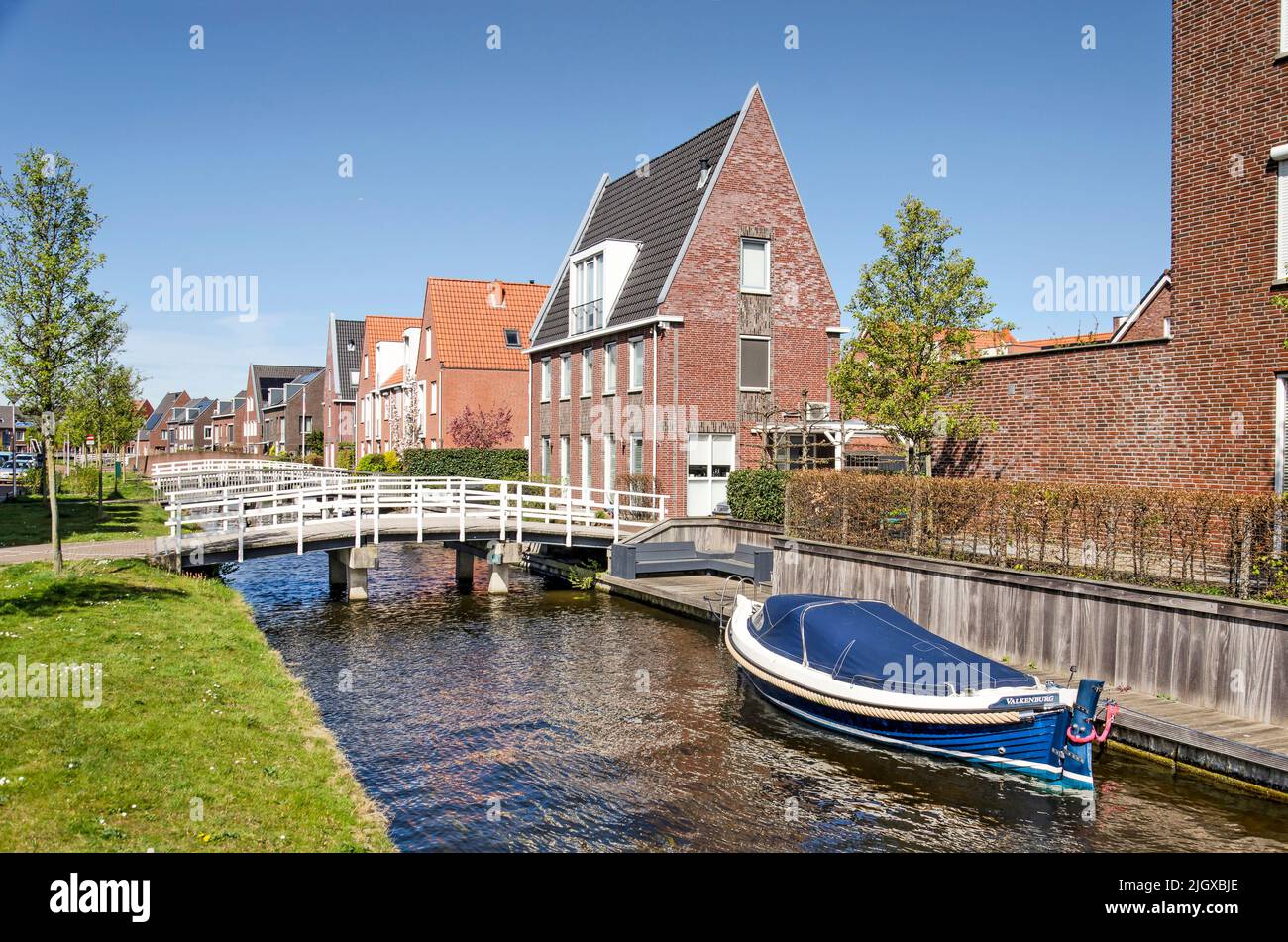 Valkenburg, The Netherlands, April 18, 2022: new neighbourhood with a village-like atmosphere, bridges and a canal Stock Photo