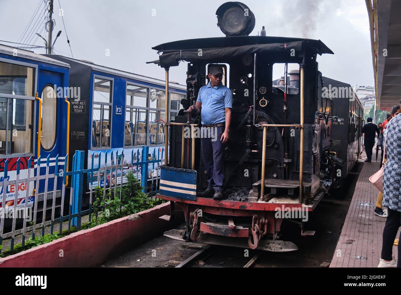 DARJEELING, INDIAN -June 22, The toy train of Darjeeling Himalayan Railway runs on the track in Darjeeling, India. Stock Photo