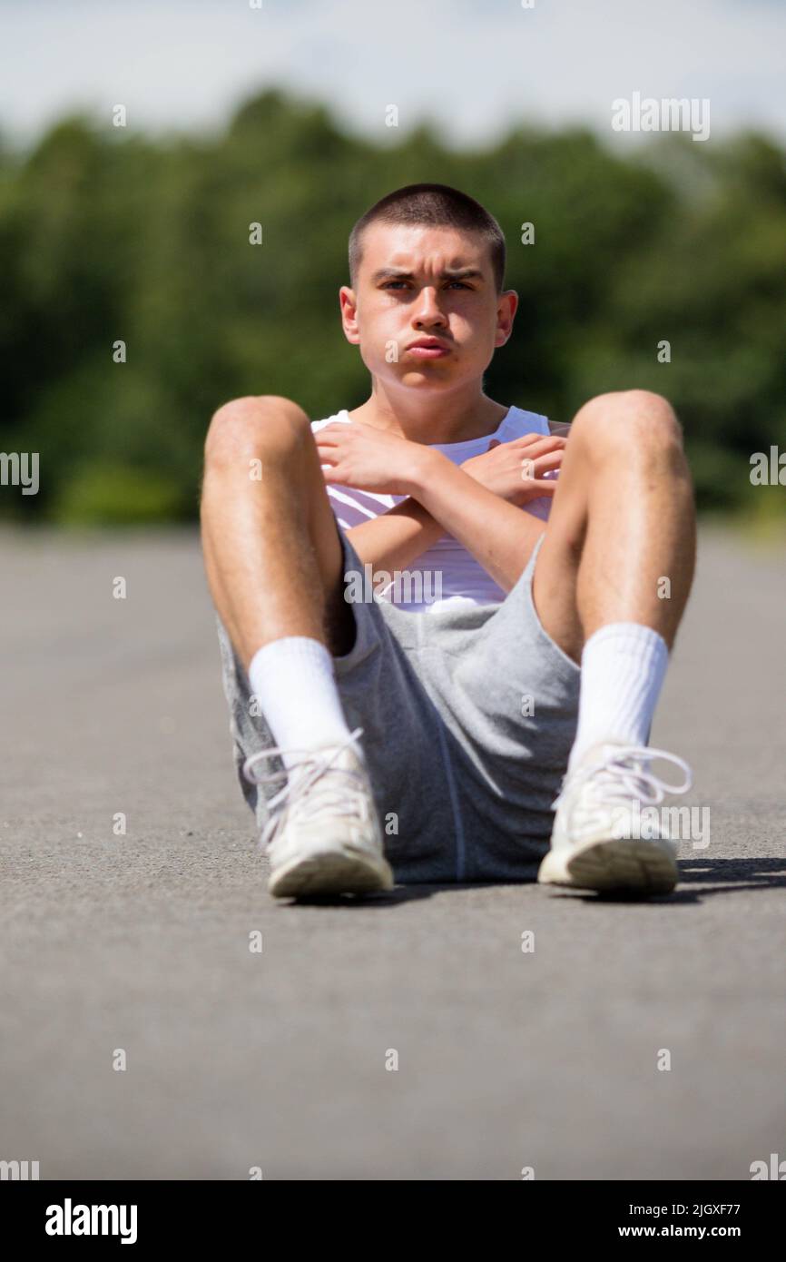 Doing situps hi-res stock photography and images - Alamy