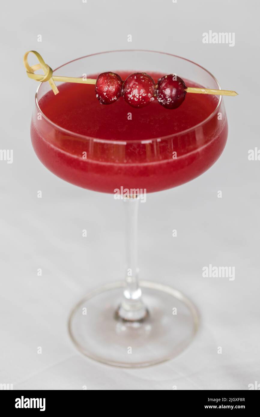 Close-up of fall cranberry cocktail with white background Stock Photo