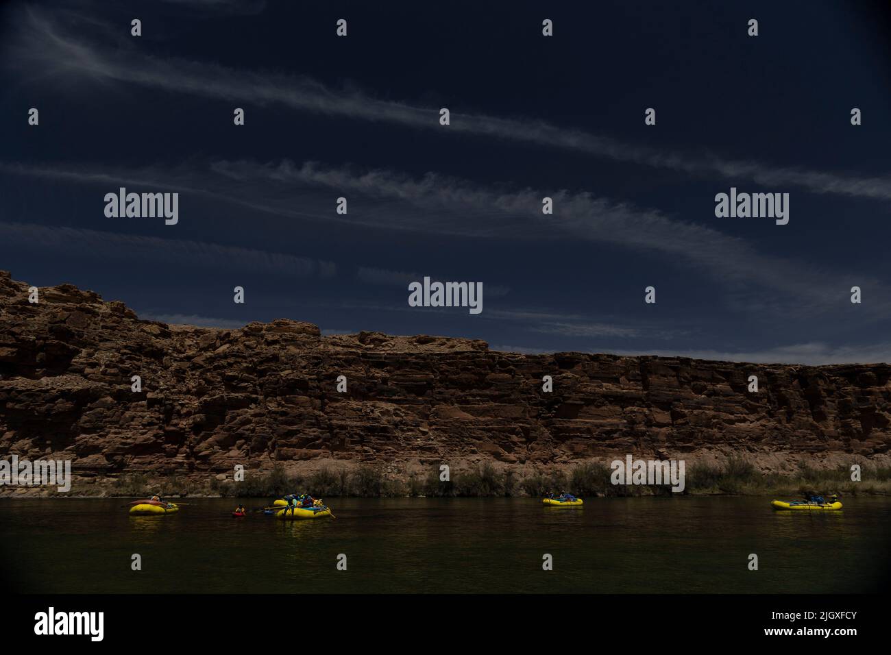 5 rafts floating down the Colorado River in the Grand Canyon Stock Photo Alamy