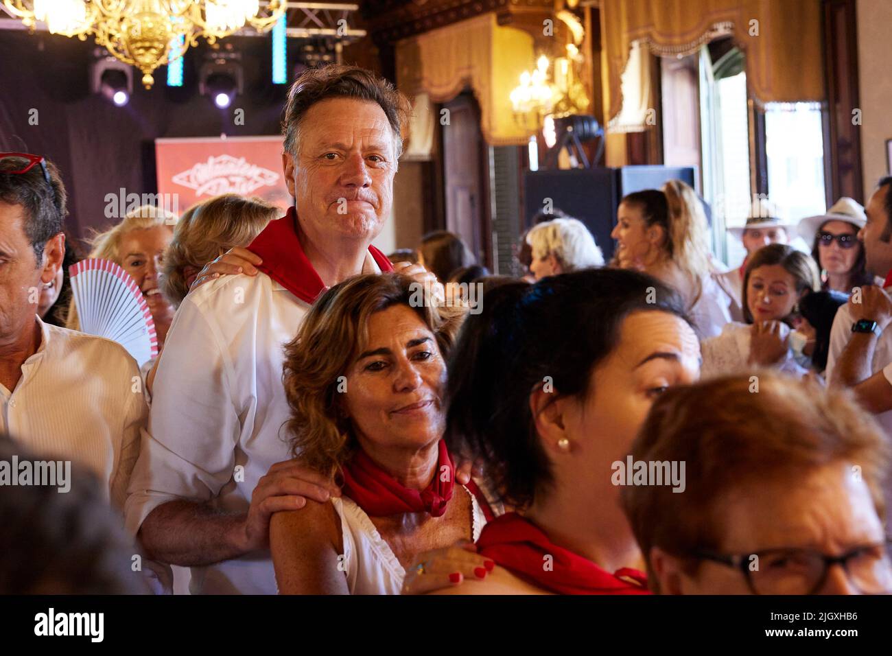 Pamplona, Navarre, Spain. 13th July, 2022. Revellers dance at the Casino during the 'Baile de la Alpargata' (Espadrille dance) on the seventh day of the San Fermin Running of the Bulls festival on July 13, 2022 in Pamplona, Spain. The annual Fiesta de San Fermin, made famous by the 1926 novel of US writer Ernest Hemmingway entitled 'The Sun Also Rises', involves the daily running of the bulls through the historic heart of Pamplona to the bull ring. (Credit Image: © Ruben Albarran/ZUMA Press Wire) Stock Photo