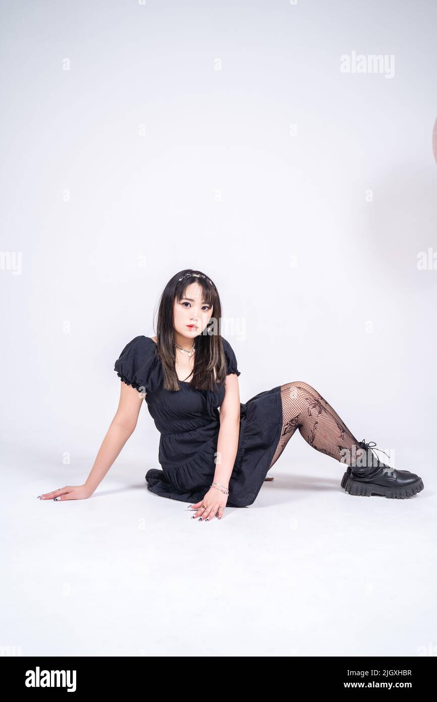 Asian woman female posing hi-res stock photography and images - Alamy