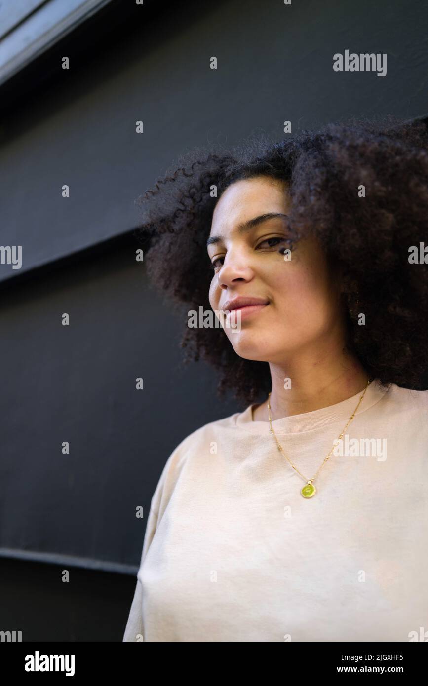 Teen dark curly hair hi-res stock photography and images - Alamy