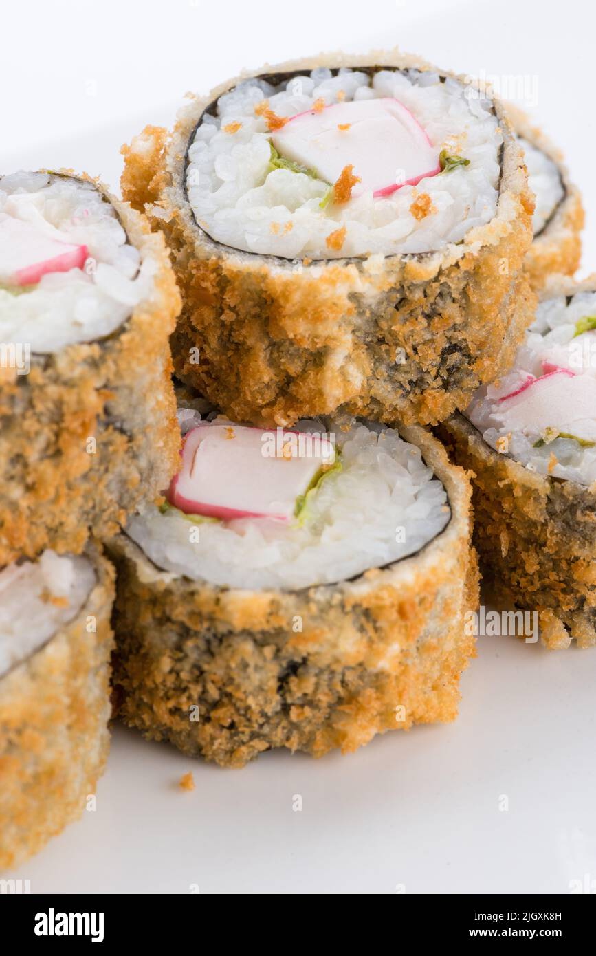 Sushi set and composition at white background. Japanese food restaurant