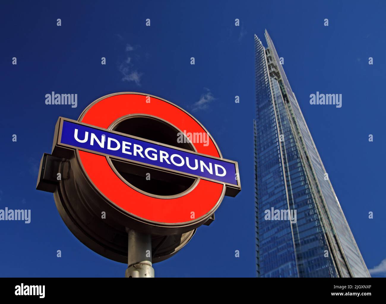 London Underground TFL Roundel and the Shard skyscraper, 32 London Bridge Road, London, England, UK, SE1 9SG Stock Photo