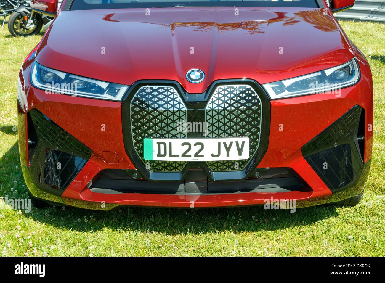 front view of red BMW electric car Stock Photo - Alamy