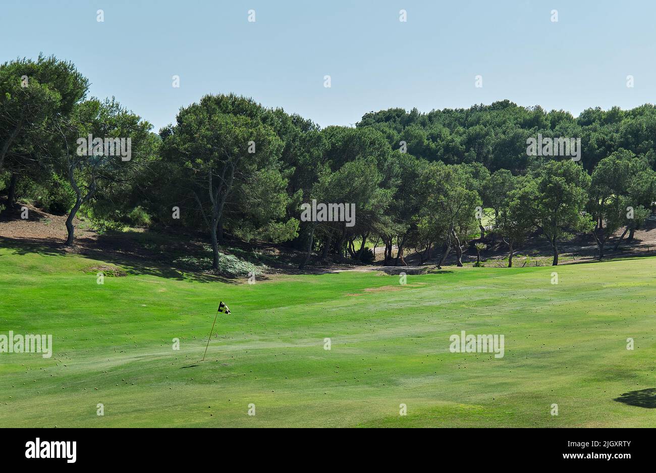 Empty golf course, green lawn, no people. Sport, recreation concept. Spain Stock Photo
