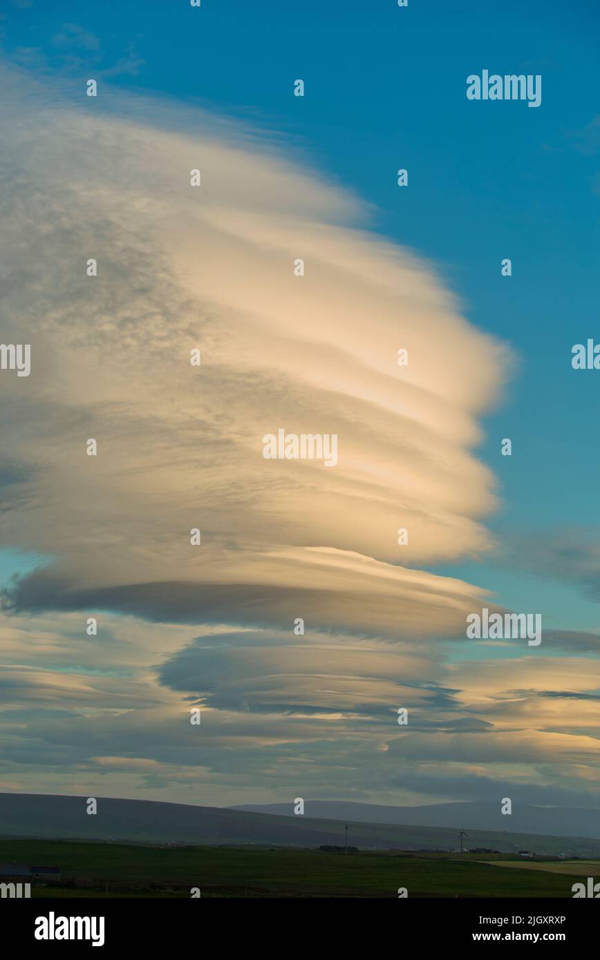 Altocumulus Lenticularis clouds, Orkney Isles Stock Photo