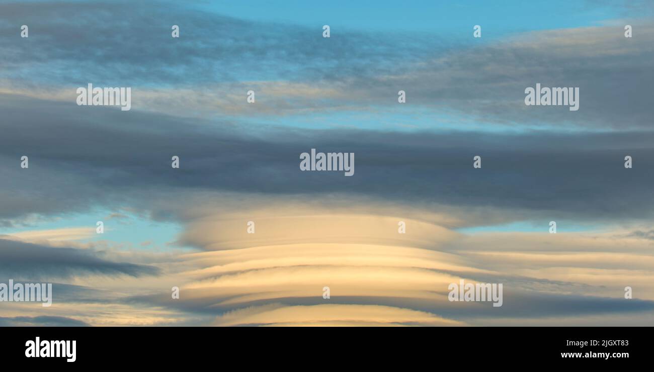 Altocumulus Lenticularis clouds, Orkney Isles Stock Photo