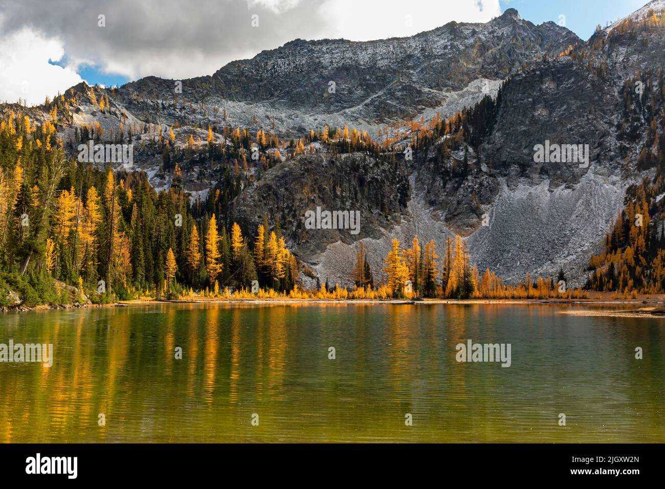 WA21738-00...WASHINGTON - Fall time at Larch Lake below Fifth of July Mountain in the Entiat Mountains of Glacier Peak Wilderness Area. Stock Photo