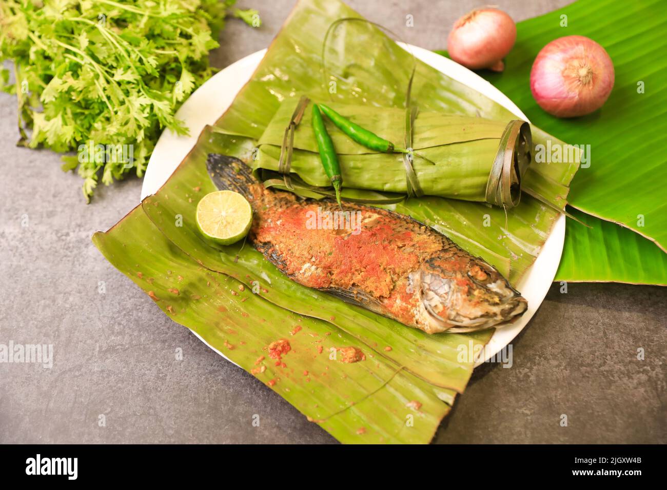 South Indian Famous Steamed Fish Recipe Stock Photo - Alamy